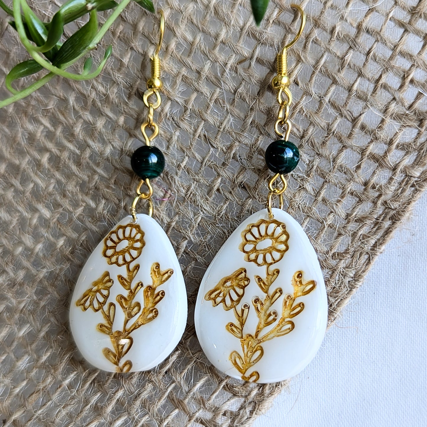 Flower embossed earrings