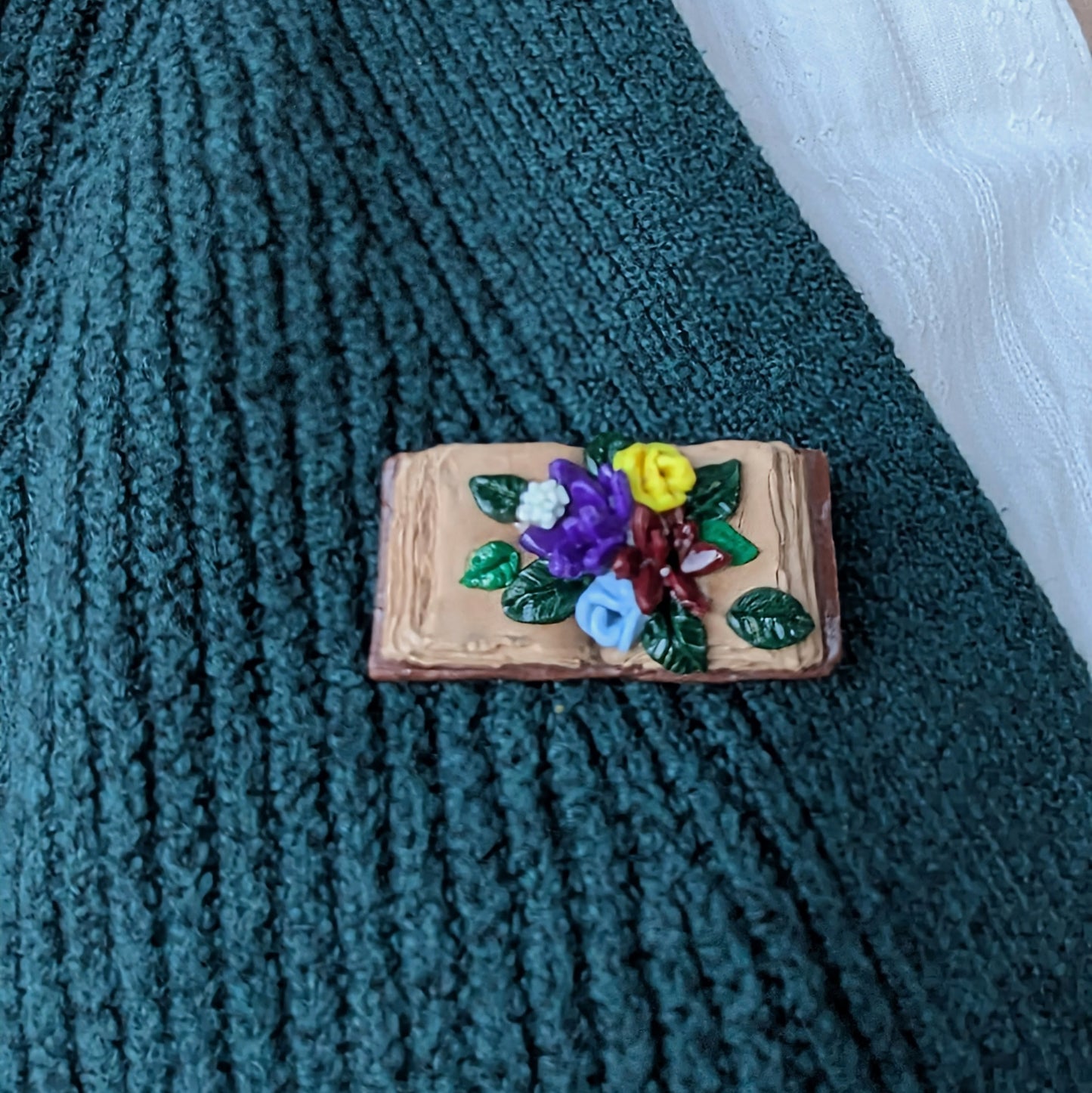 Blooming book pin