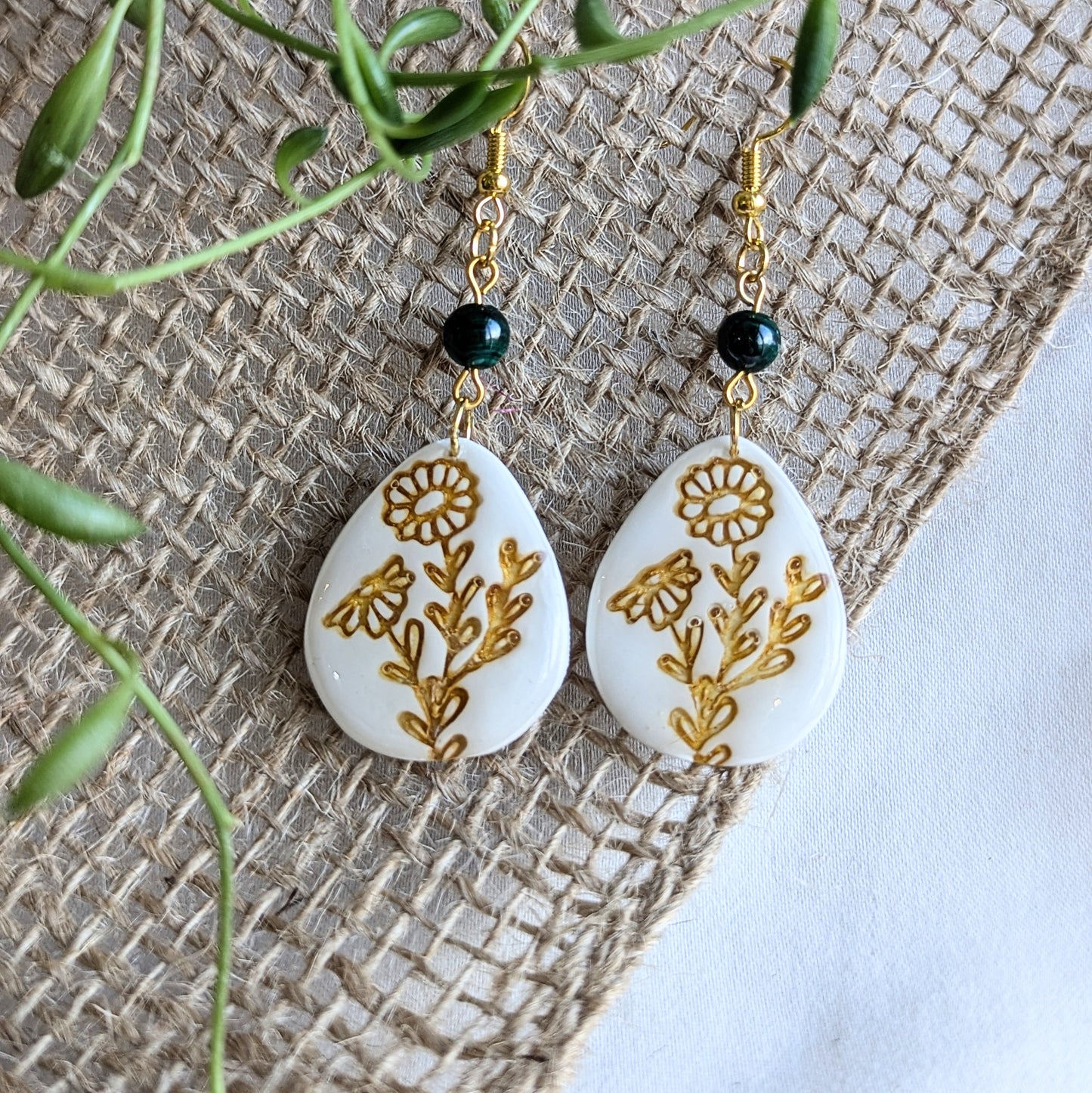 Flower embossed earrings